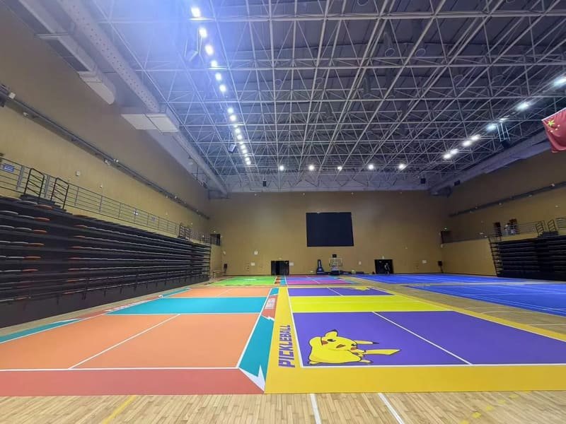 Close-up of PVC sports flooring layers and wear surface